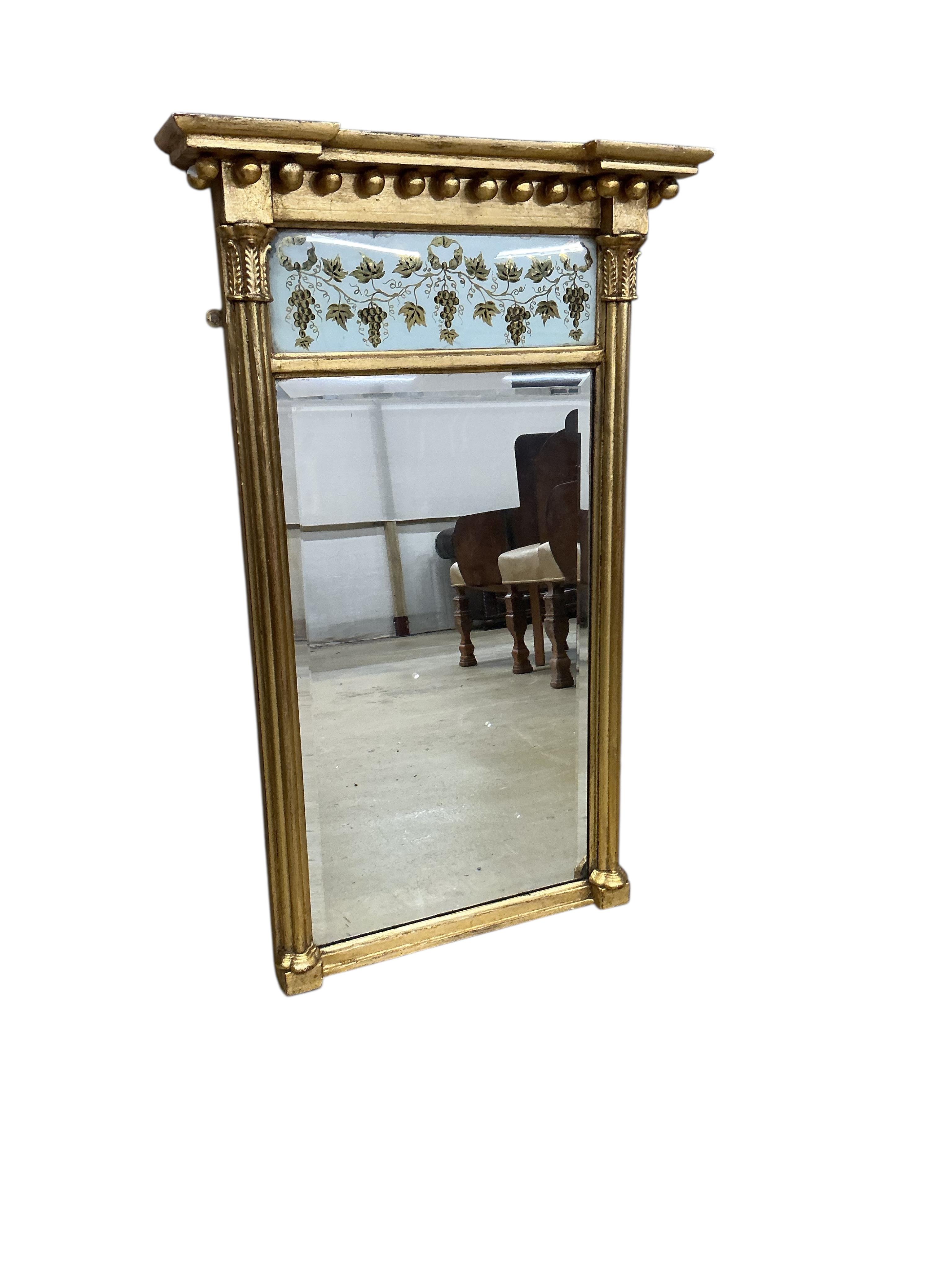 A Regency giltwood and composition pier glass, width 52cm, height 84cm